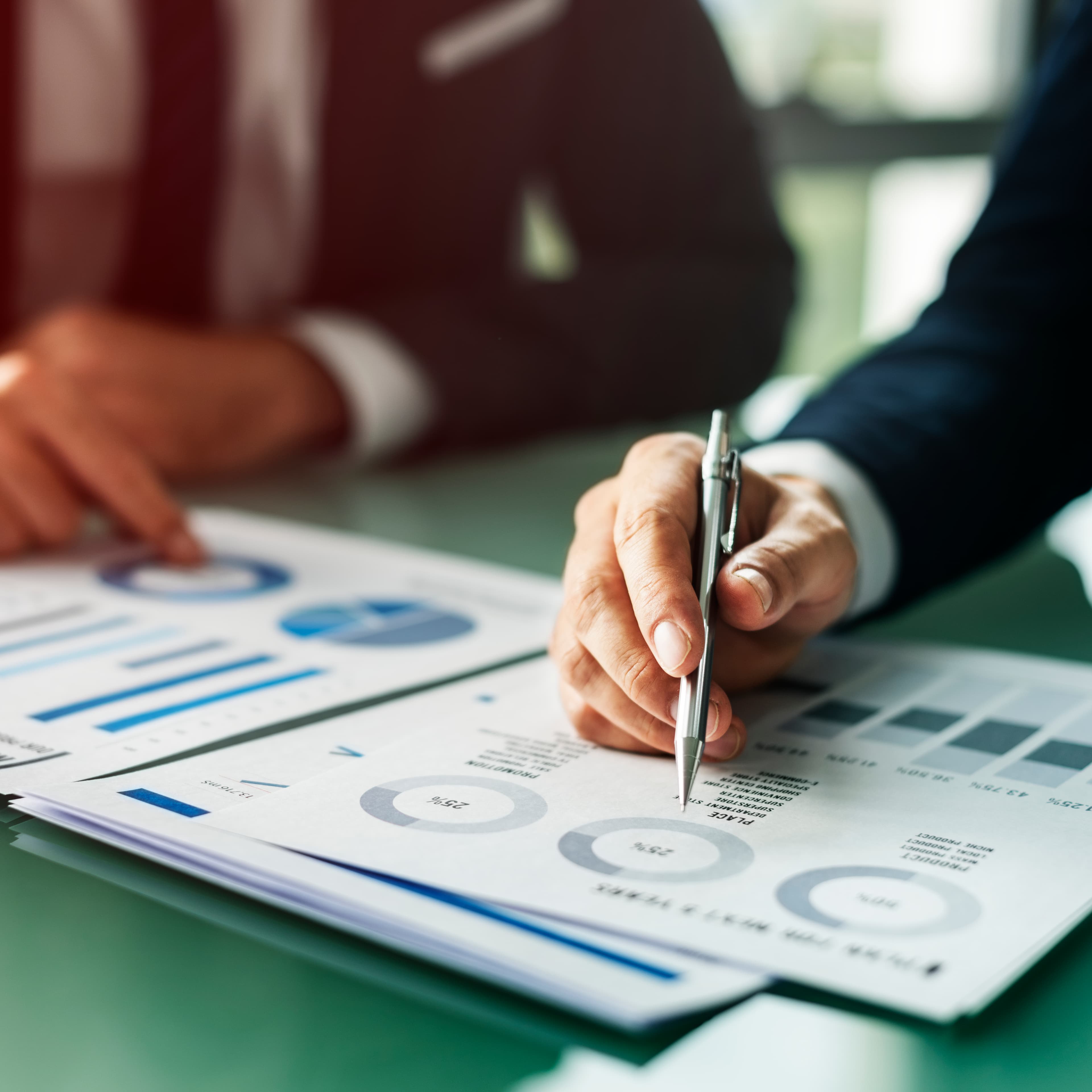 business-professionals-reviewing-financial-documen-2026-09-25-08-11-17-utc